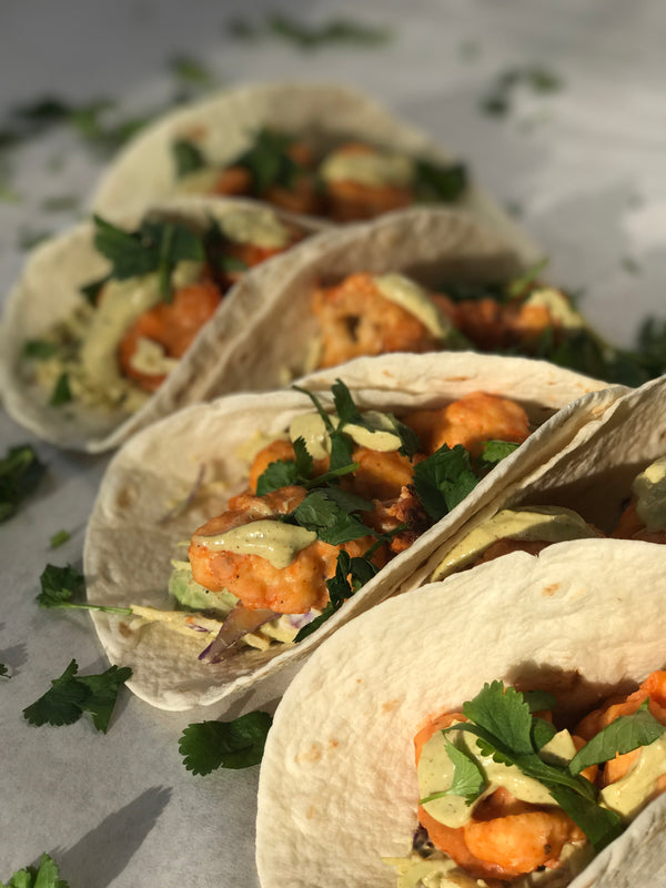 Buffalo Cauliflower Tacos with Southwest Avocado Crema