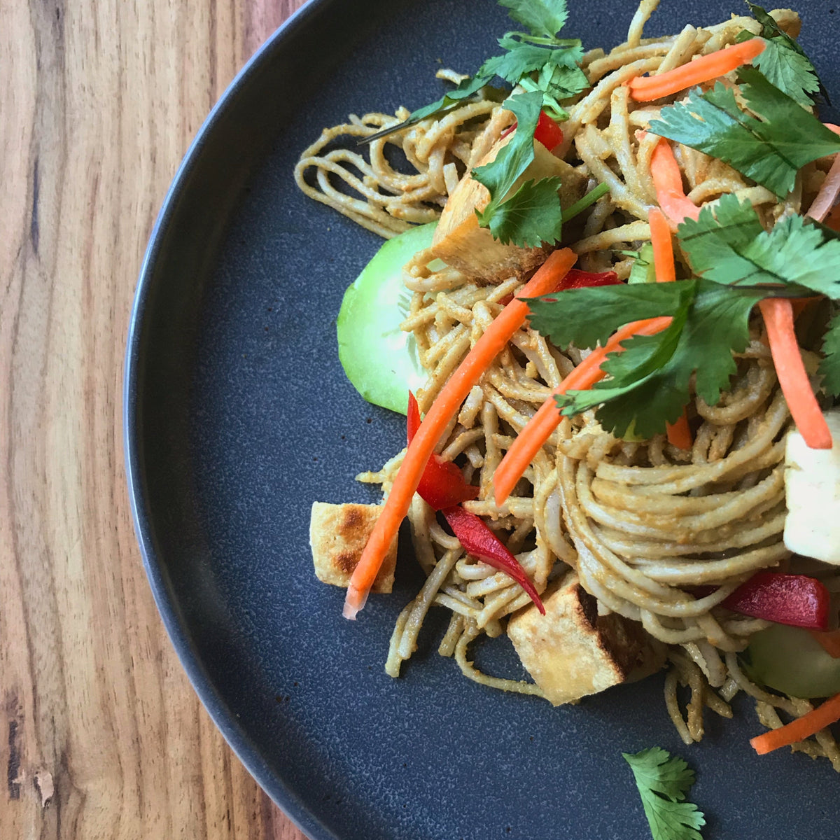 Soba noodles topped with Peanut sauce